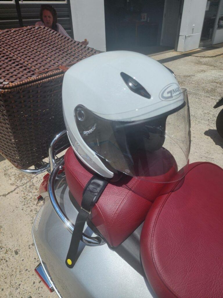 helmet on the seat of a Vespa